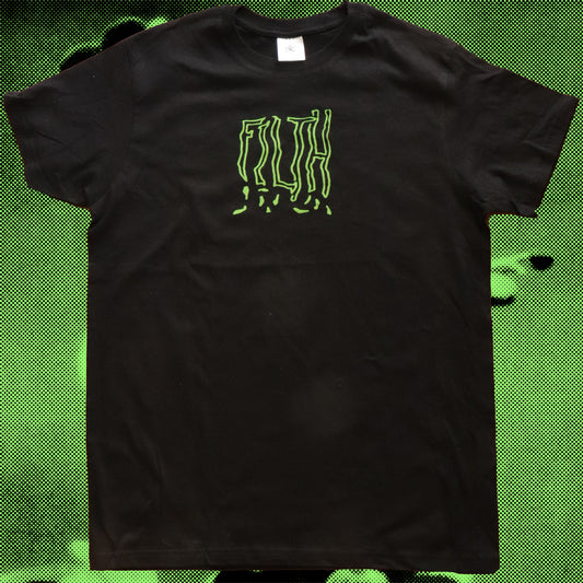 Front view of black t-shirt, FILTH is written with bold writing in neon green.