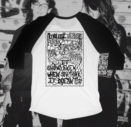 Back of white and black baseball shirt with chain design that writes Privilege is like food between your teeth it shows even when you think it doesn't, hand screen printed with Bipolia logo on the collar.