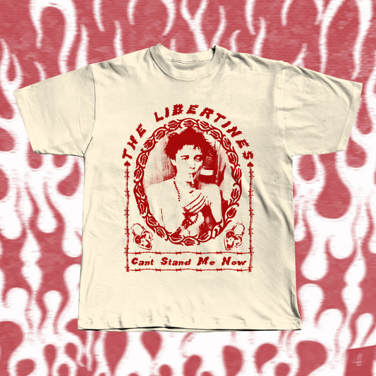 Handmade beige t-shirt with bold red screen-printed fan art inspired by The Libertines. Features a vintage-style portrait framed in barbed-wire pattern, with the band name “The Libertines” above and the song title “Can’t Stand Me Now” below.