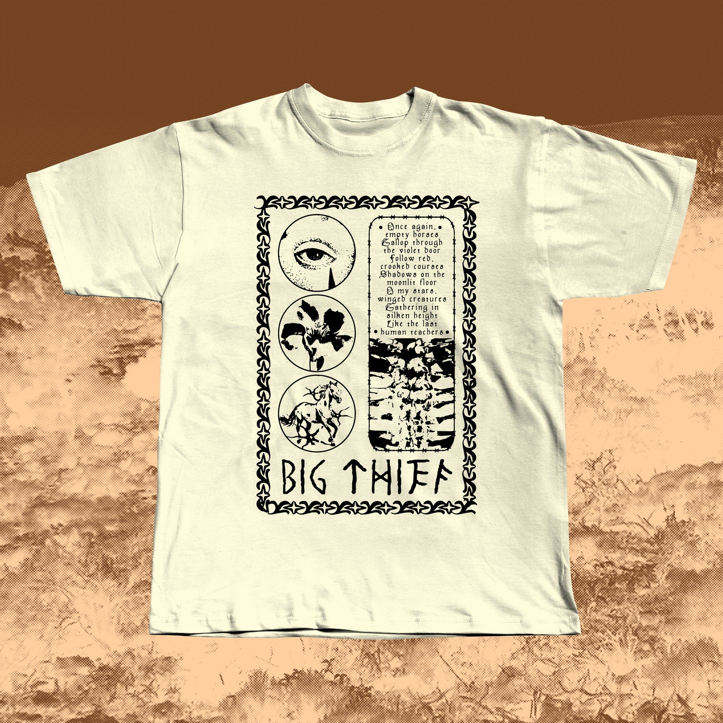 Beige T-shirt with black vintage-style print featuring an eye, flower, skeleton ribcage, and a poetic text block framed by a decorative border with “BIG THIEF” written at the bottom.
