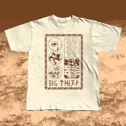Beige T-shirt with earthy brown vintage-style print featuring an eye, flower, skeleton ribcage, and a poetic text block framed by a decorative border with “BIG THIEF” written at the bottom.