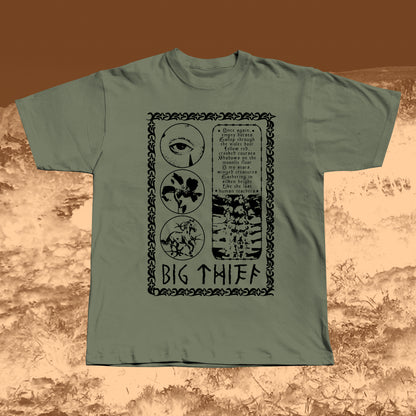 Khaki T-shirt with black vintage-style print featuring an eye, flower, skeleton ribcage, and a poetic text block framed by a decorative border with “BIG THIEF” written at the bottom.