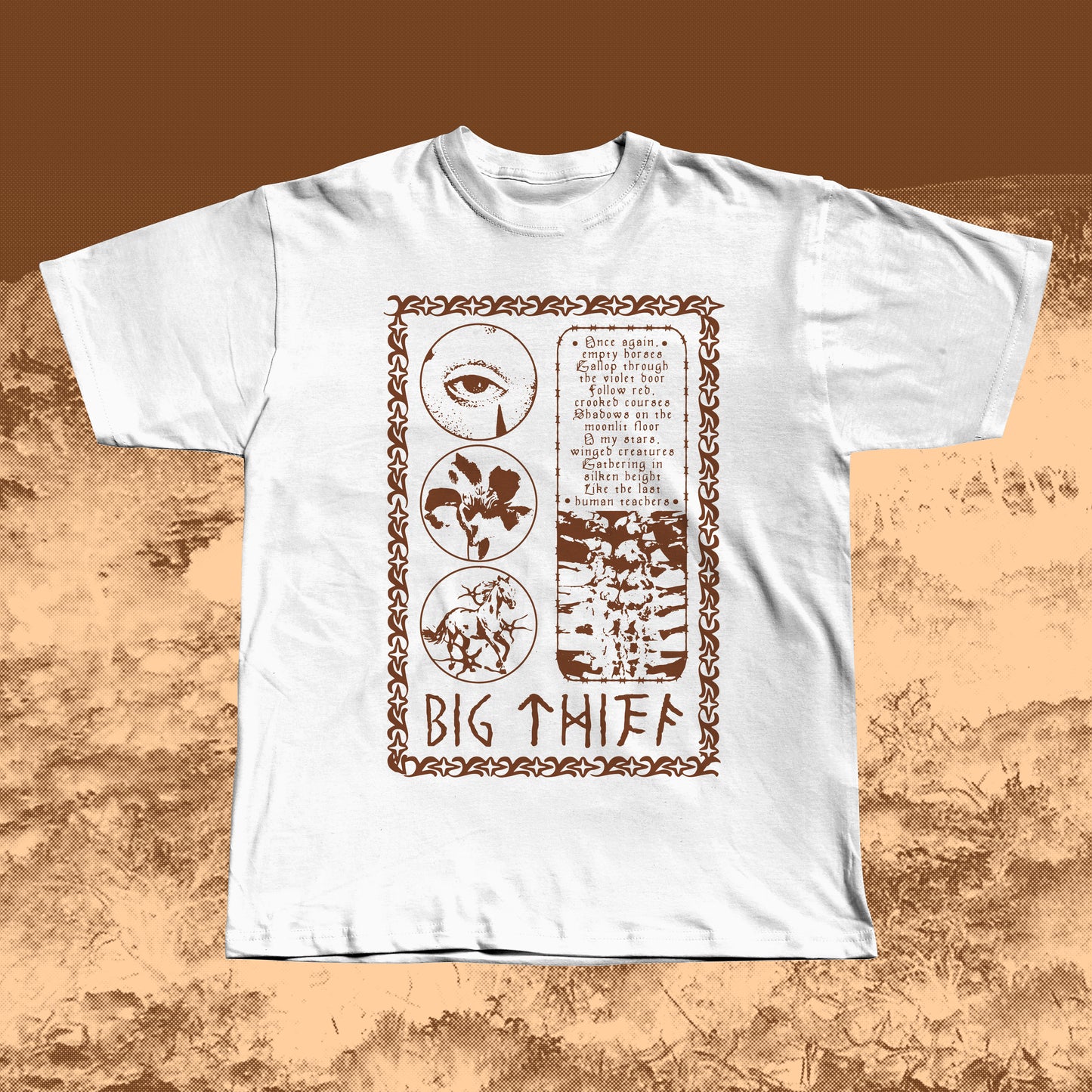 White T-shirt with earthy brown vintage-style print featuring an eye, flower, skeleton ribcage, and a poetic text block framed by a decorative border with “BIG THIEF” written at the bottom.