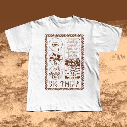 White T-shirt with earthy brown vintage-style print featuring an eye, flower, skeleton ribcage, and a poetic text block framed by a decorative border with “BIG THIEF” written at the bottom.