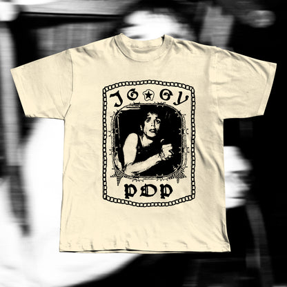 Unisex adult beige t-shirt, design with iggy pop tangled in a chair around barbed wire. Iggy pop is written around with gothic letters.