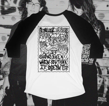 Back of white and black baseball shirt with chain design that writes Privilege is like food between your teeth it shows even when you think it doesn't, hand screen printed with Bipolia logo on the collar.
