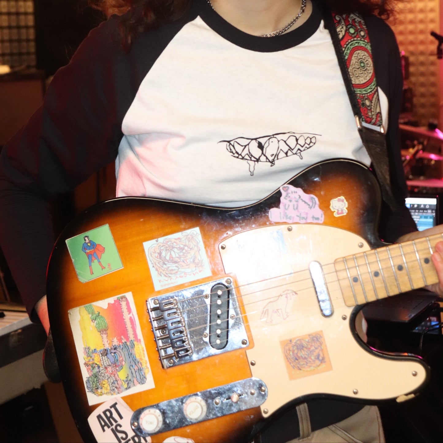 Teeth baseball shirt worn by Bipolia