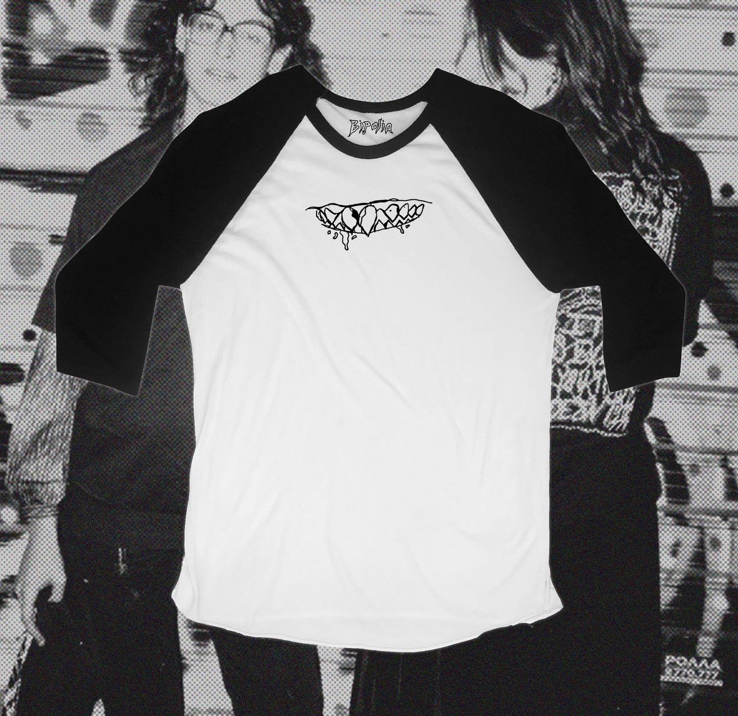 White and black baseball shirt with teeth design in front, hand screen printed with Bipolia logo on the collar.