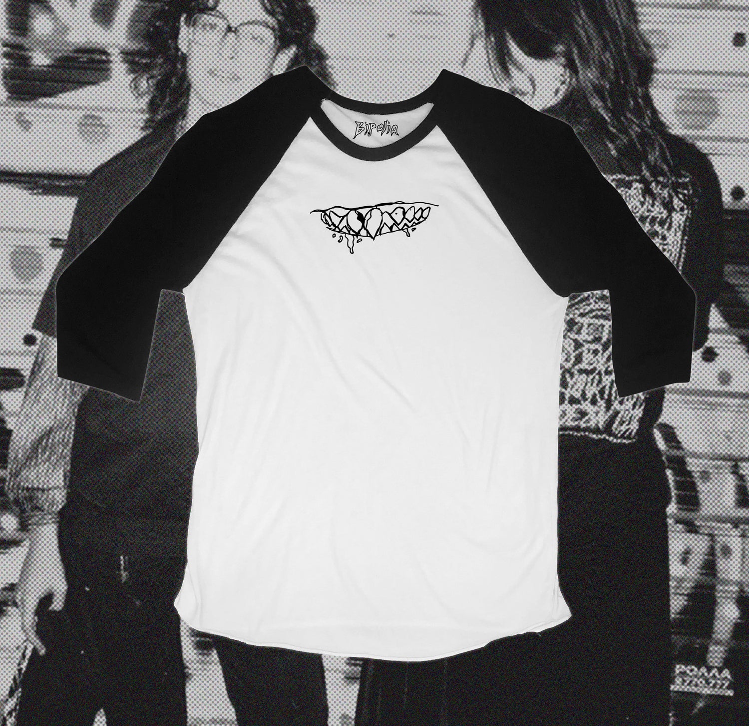 White and black baseball shirt with teeth design in front, hand screen printed with Bipolia logo on the collar.