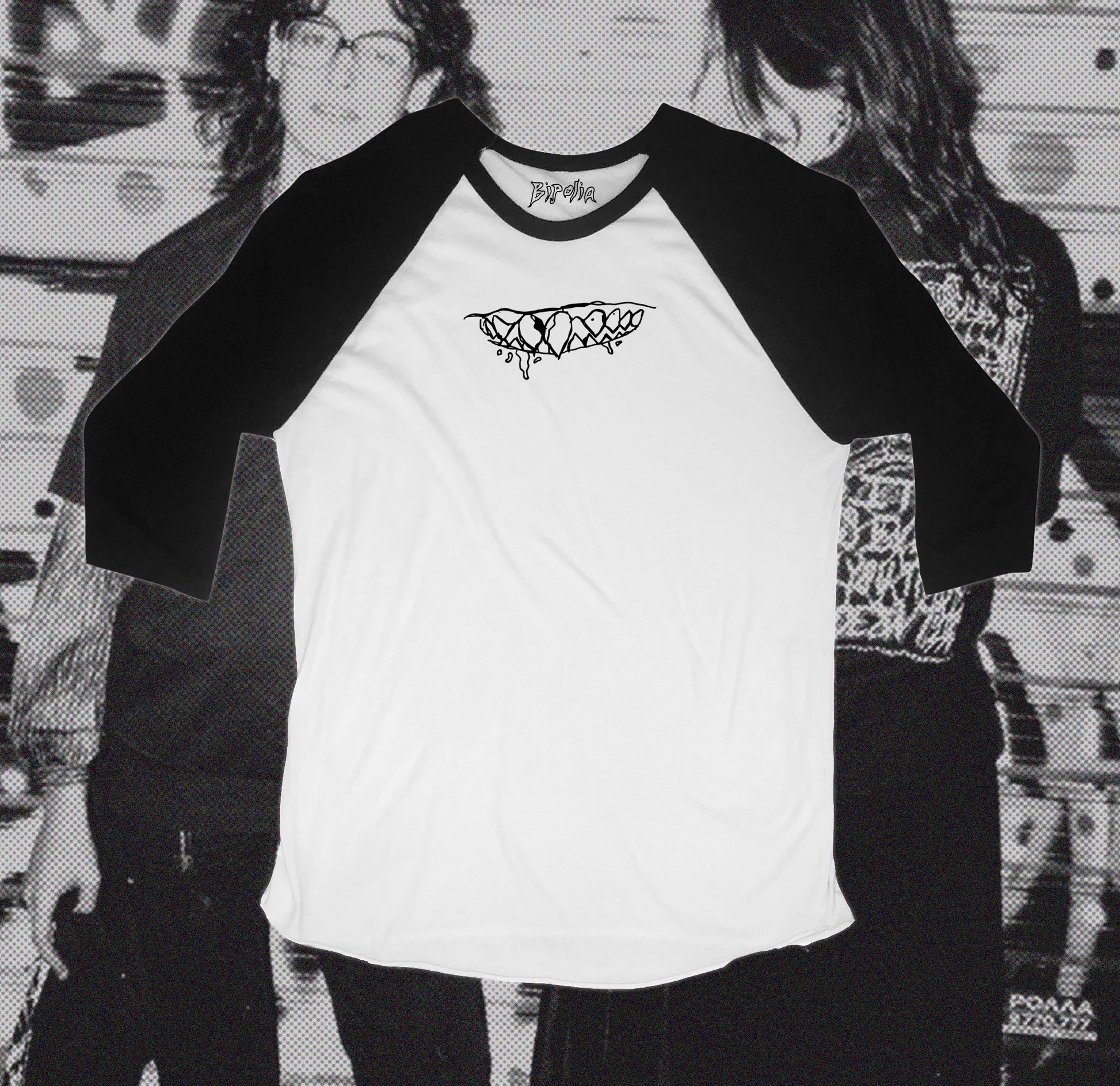 White and black baseball shirt with teeth design in front, hand screen printed with Bipolia logo on the collar.