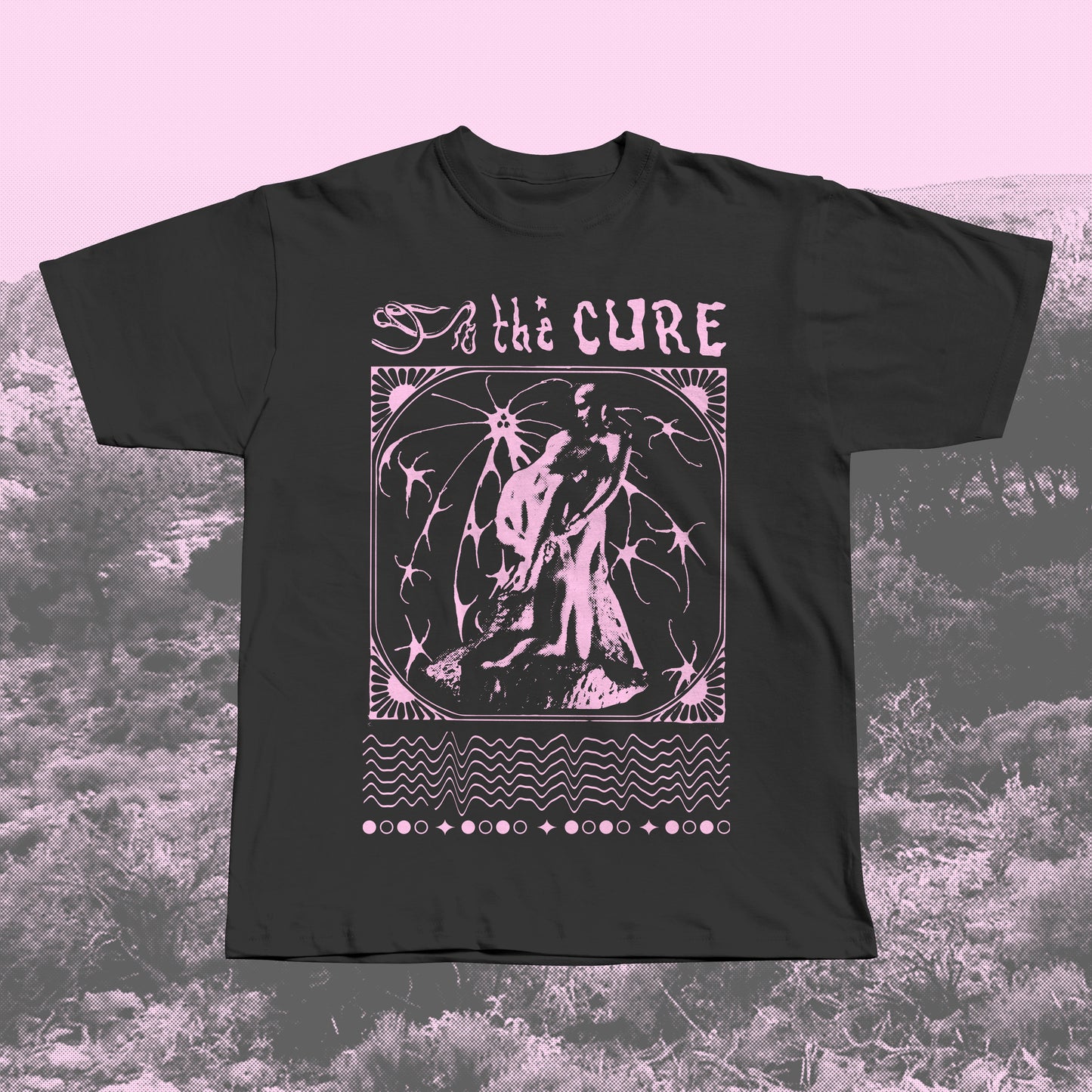Black handmade screen-printed T-shirt with pink The Cure-inspired gothic design featuring a romantic statue, ornate border, and abstract lines.