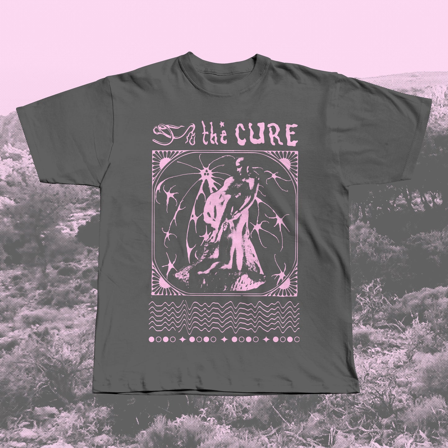 Gray handmade screen-printed T-shirt with pink The Cure-inspired gothic design featuring a romantic statue, ornate border, and abstract lines.