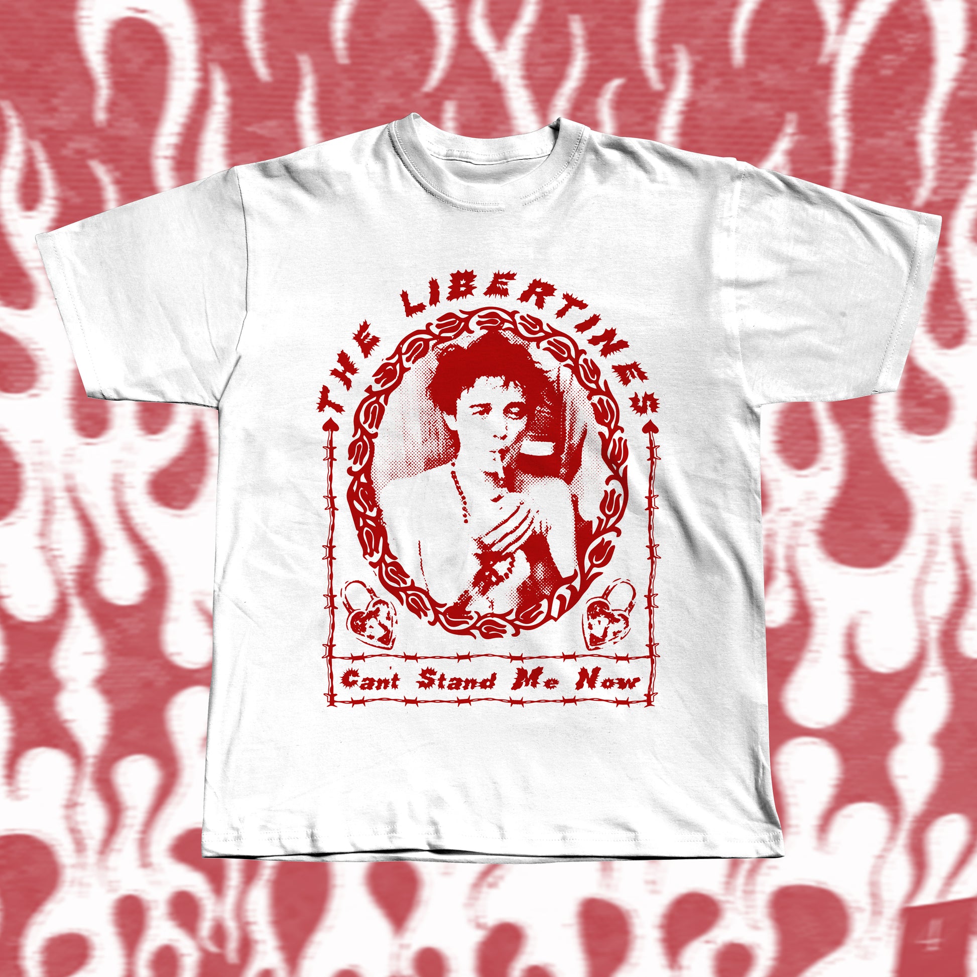 Handmade white t-shirt with bold red screen-printed fan art inspired by The Libertines. Features a vintage-style portrait framed in barbed-wire pattern, with the band name “The Libertines” above and the song title “Can’t Stand Me Now” below.
