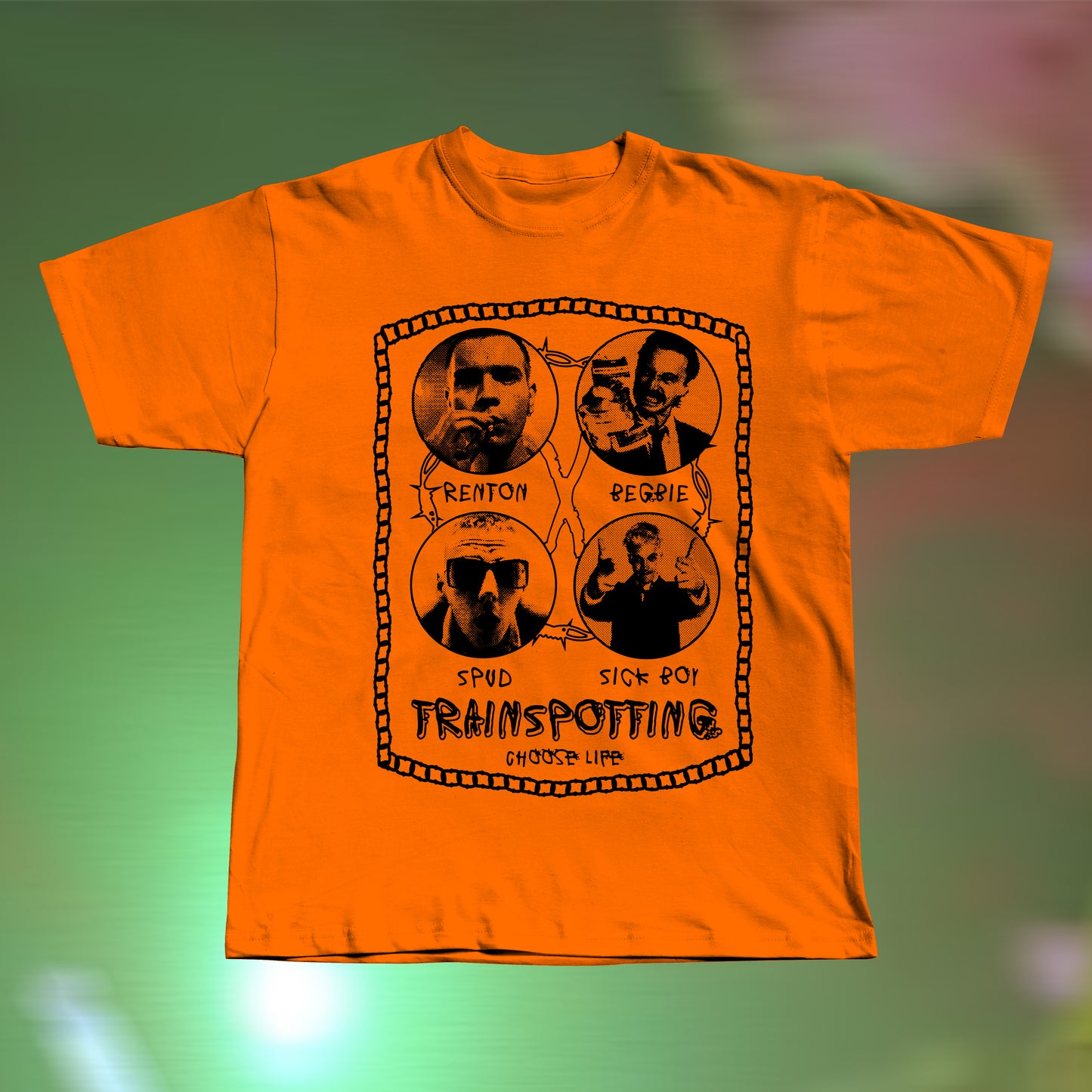 Front view of a Trainspotting-inspired hand screen printed orange T-shirt with bold retro movie graphic.