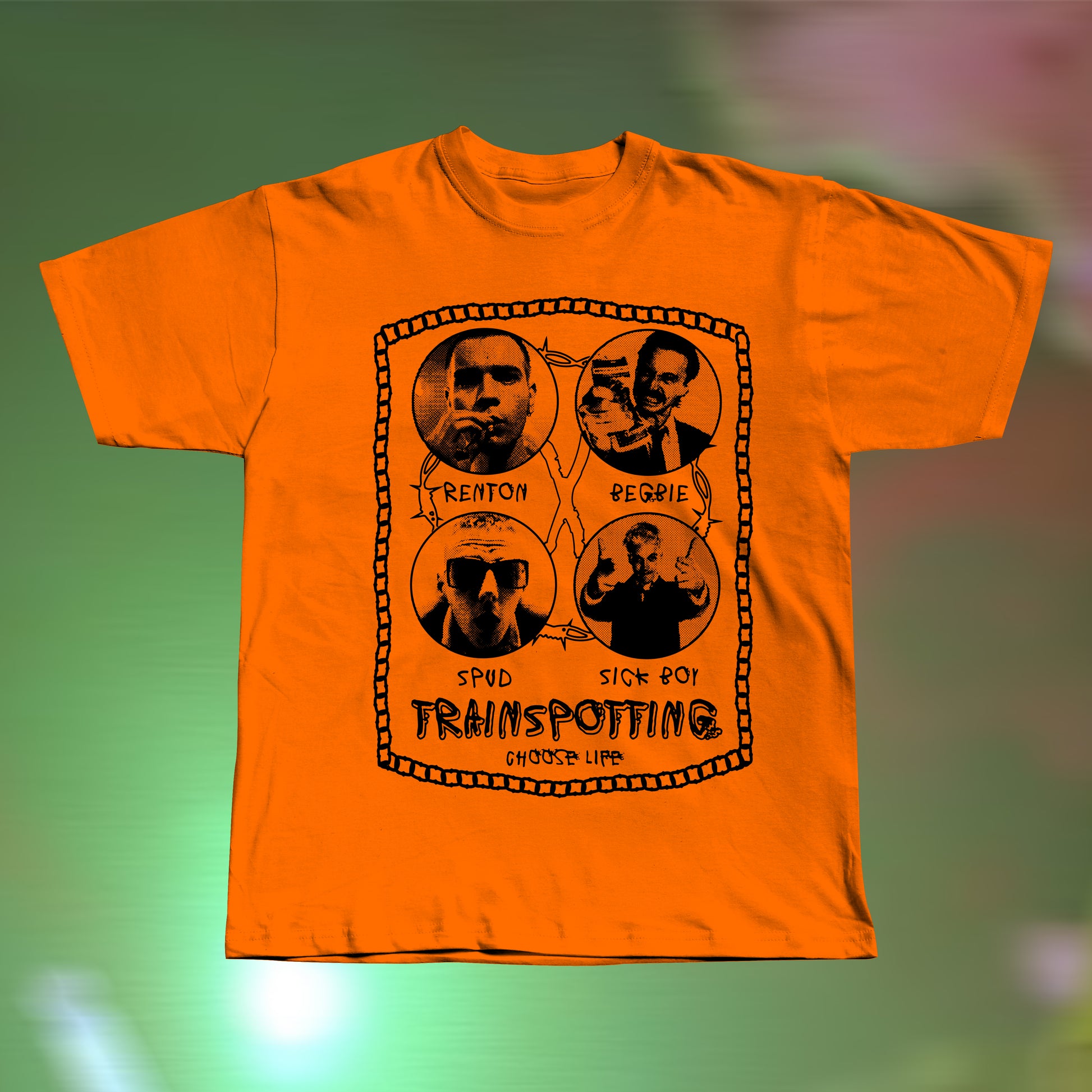 Front view of a Trainspotting-inspired hand screen printed orange T-shirt with bold retro movie graphic.