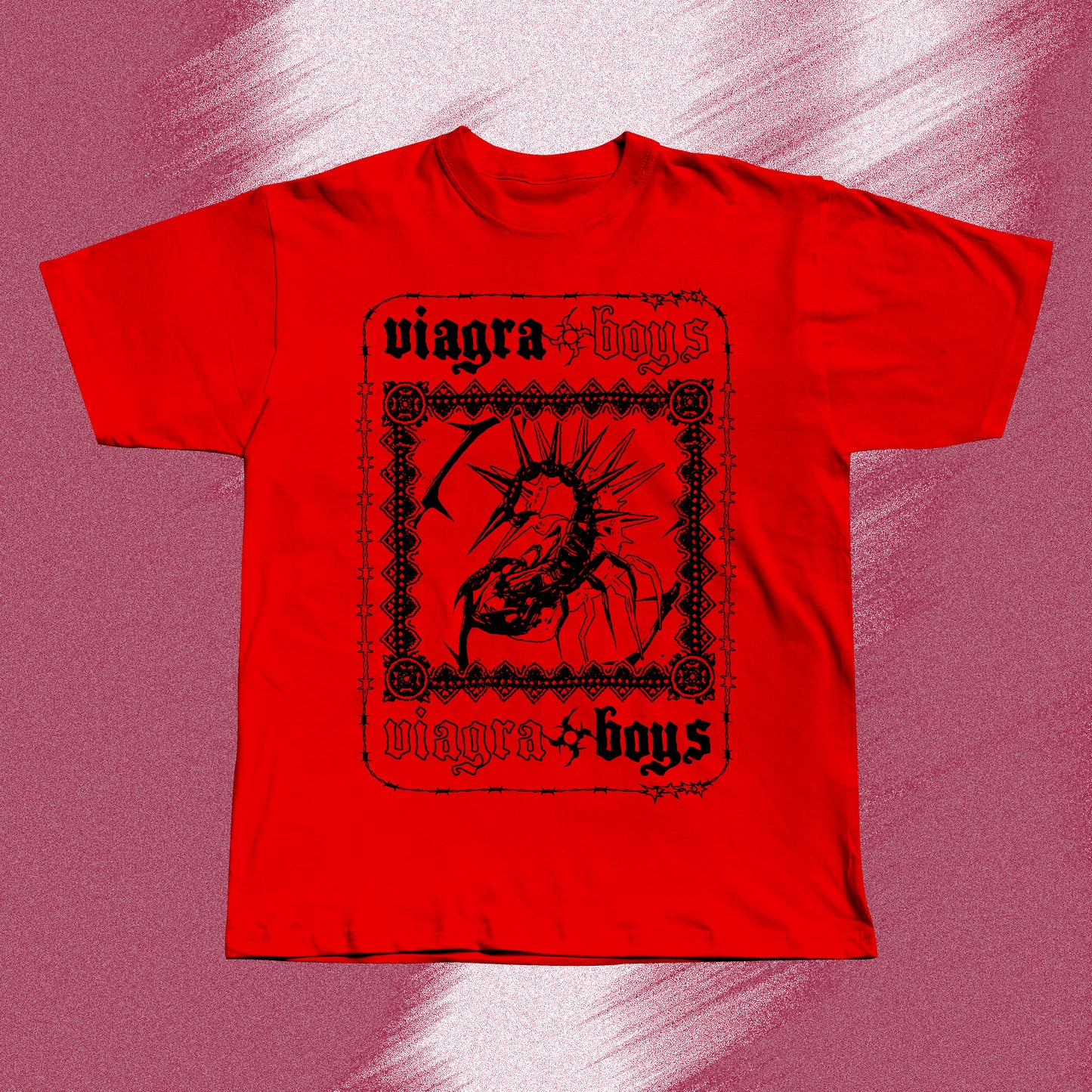 Red hand screen printed t-shirt with a black graphic print of a spider with spikes on its back. The spider is inside a black frame with the words 'viagra boys' written above and below the spider.