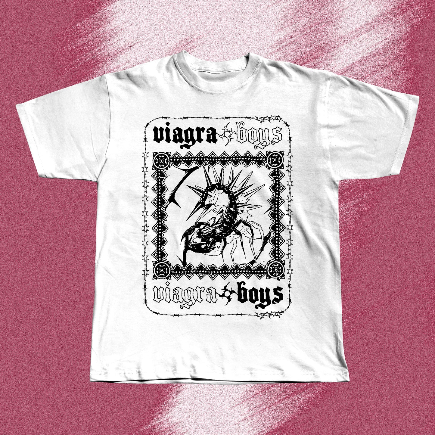 White hand screen printed t-shirt with a black graphic print of a spider with spikes on its back. The spider is inside a black frame with the words 'viagra boys' written above and below the spider.
